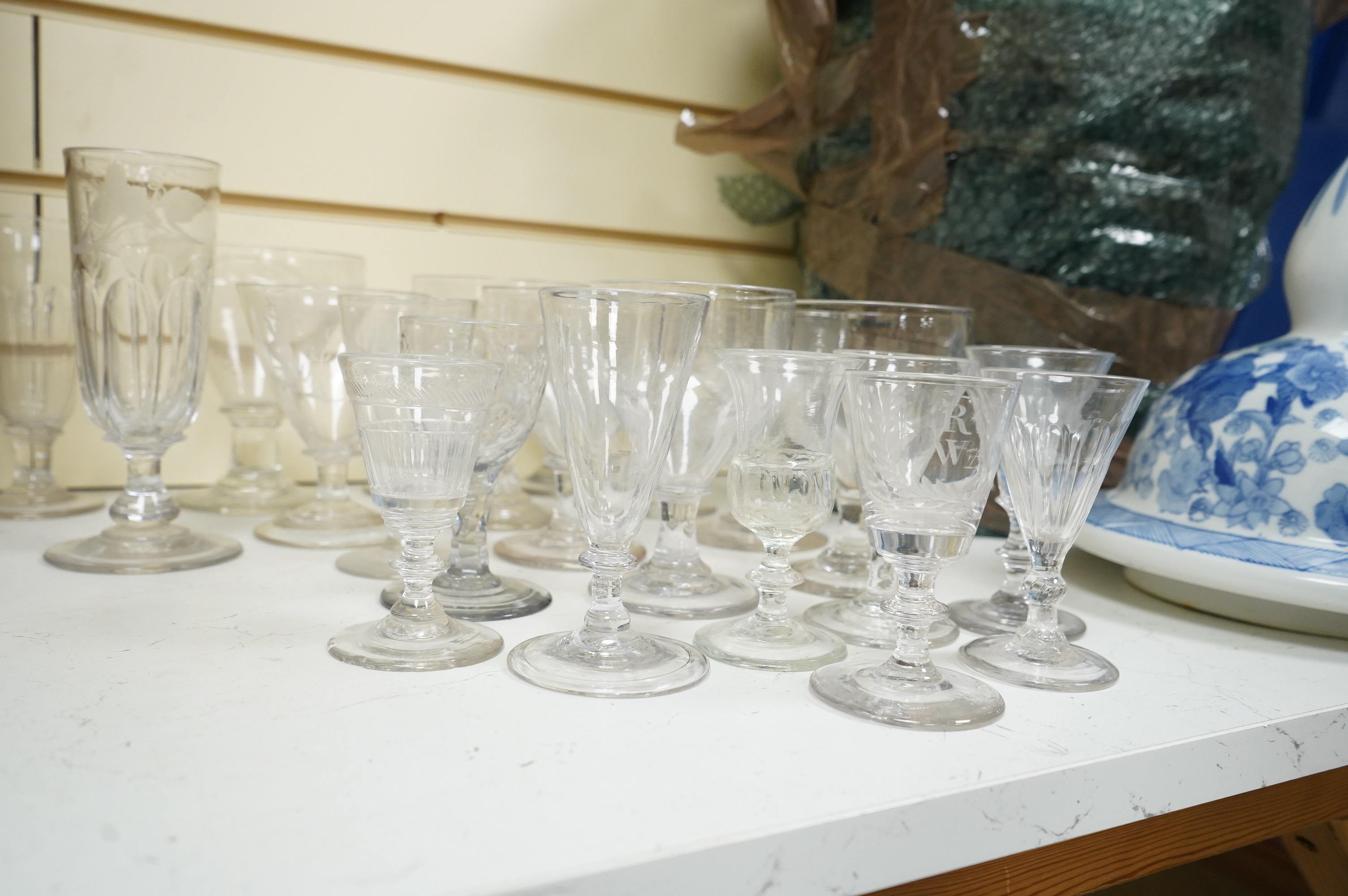 Twenty-one various drinking glasses, largely 19th century
